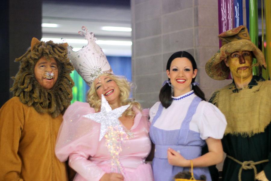 David True, Donna Latson, Jessica True, and Chuck Andrews dress as the characters from The Wizard of Oz at the Grand Ball on March 29.