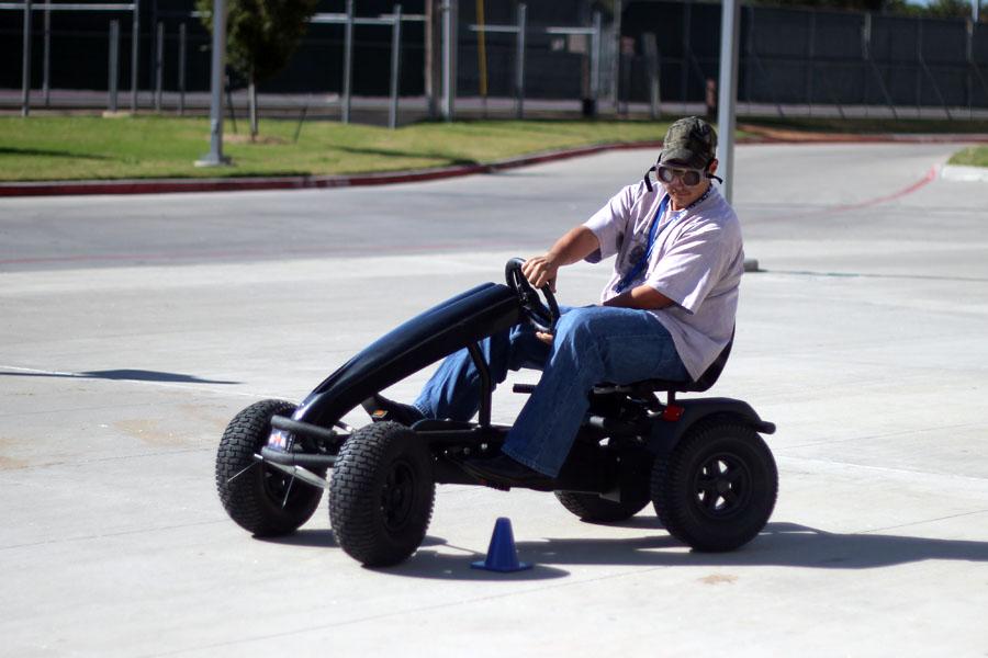 Senior James Sicilliano watches the wheels to avoid hitting any cones during Red Ribbon Week.