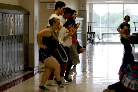 Latino club dancers practice for their event on May 1 in the auditorium. 