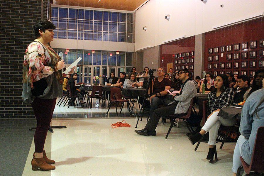 Senior Gabrielle Trinidad recites her poem,