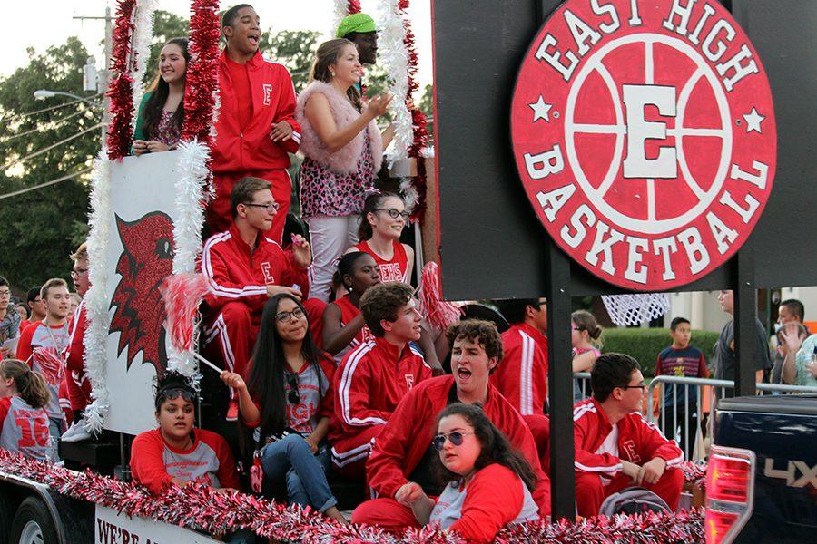 The theater float advertises this year's musical, High School Musical. Members of the cast and crew sung along to some of the music as the float drove by on Wednesday, Oct. 19.