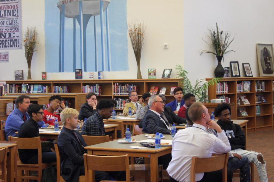 Members+of+Men+of+Distinction+listen+to+a+community+service+speech.