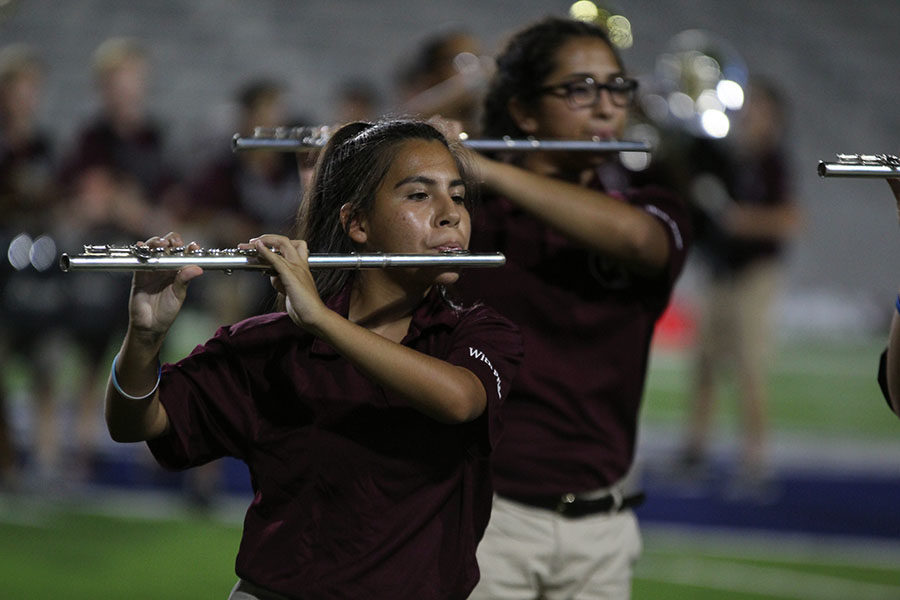 Junior+Brianna+Guerra+plays+her+flute+during+the+halftime+show+at+the+football+game+against+McKinney+Boyd+on+Thursday%2C+Sept.+13.