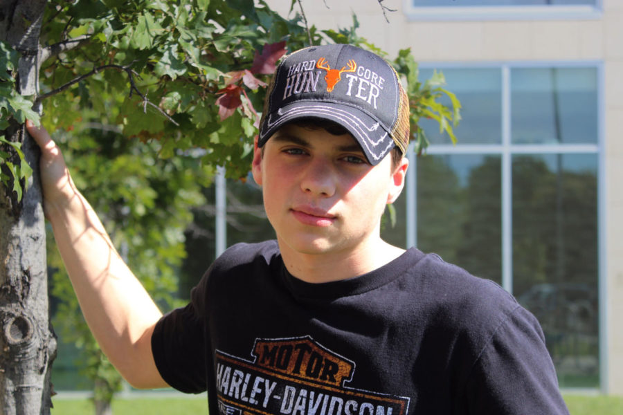 Senior+Noah+Koscelnik+flaunts+his+hunting+gear.