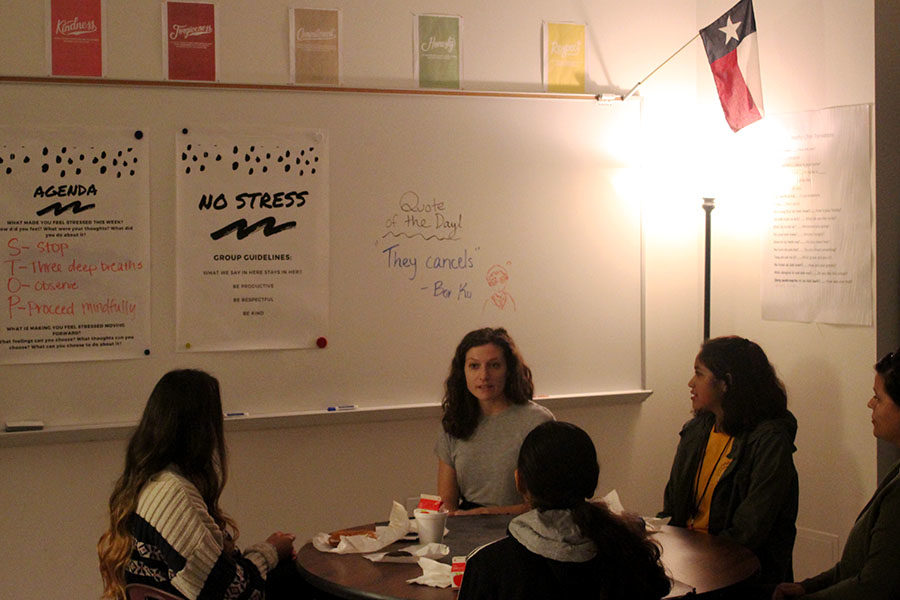 Social+worker+Chelsea+Davis+talks+to+new+club+members+about+ways+of+handling+their+stress+during+the+club+meeting+on+Thursday%2C+Nov.+29.
