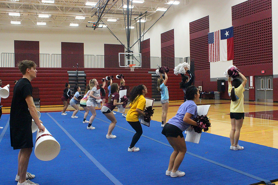 The+varsity+cheer+team+practices+their+routine+for+nationals+during+a+third+period+practice+on+Friday%2C+Jan.+25.