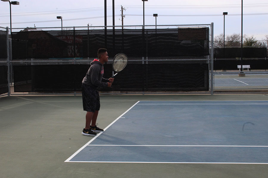 Sophomore+Nicholas+Ward+prepares+to+receive+a+serve+during+practice+on+Wednesday%2C+Feb.+13.+