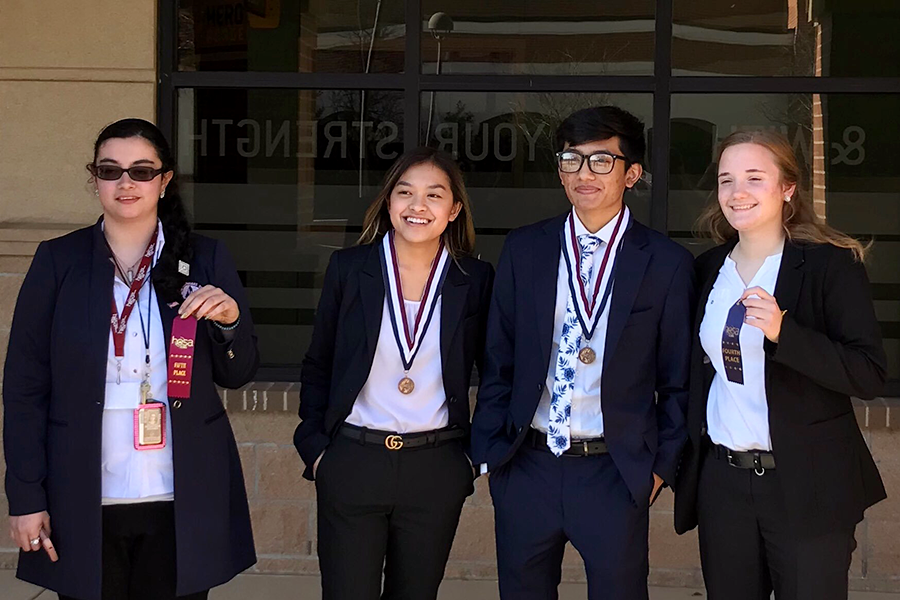 Junior+Benafsha+Sidhwa+and+seniors+Megan+Phan%2C+Amos+Nun+Sung+and+Fallon+Hale+hold+their+awards+from+region+on+Saturday%2C+Jan.+26.+Courtesy+of+Kelly+Lancaster.