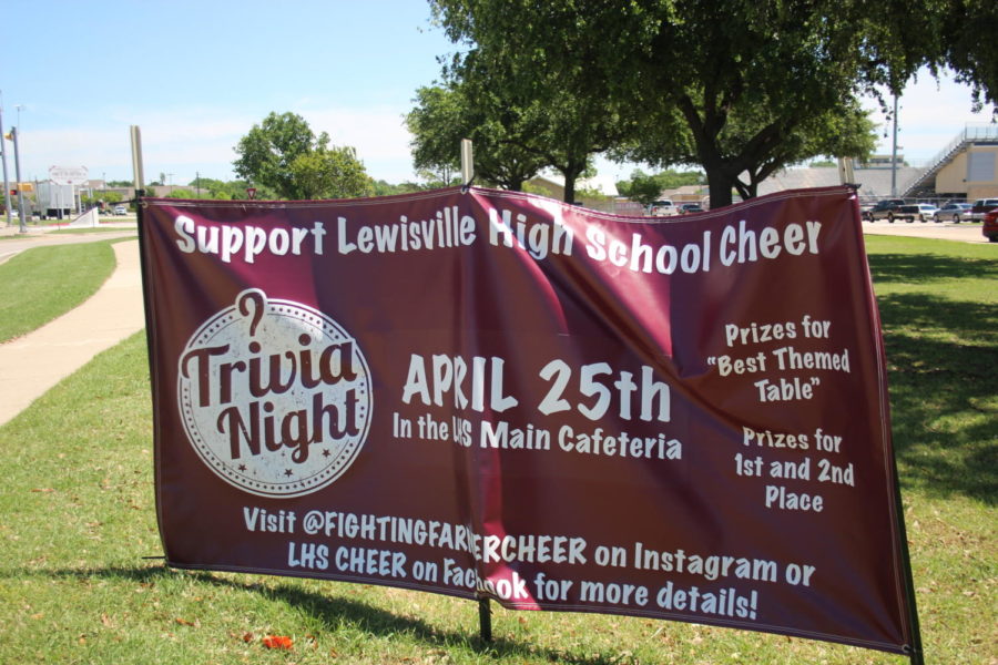 A+sign+is+displayed+at+the+entrance+of+the+school+to+attract+more+attendees+to+cheer%27s+trivia+night+on+Thursday%2C+April+25.
