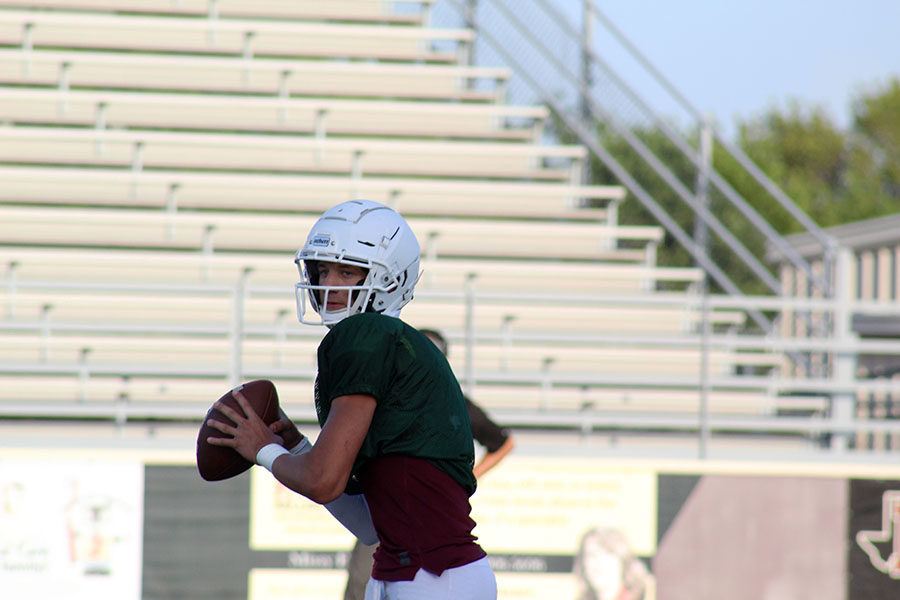 Junior+quarterback+Landon+Webster+%287%29+prepares+to+throw+the+ball+at+the+home+scrimmage+against+The+Colony+on+Thursday%2C+Aug.+22.