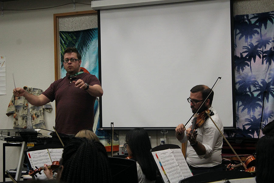 Orchestra+directors+Richard+Greenwood+and+James+Zauner+co-direct+during+third+period+on+Tuesday%2C+Sept.+17.