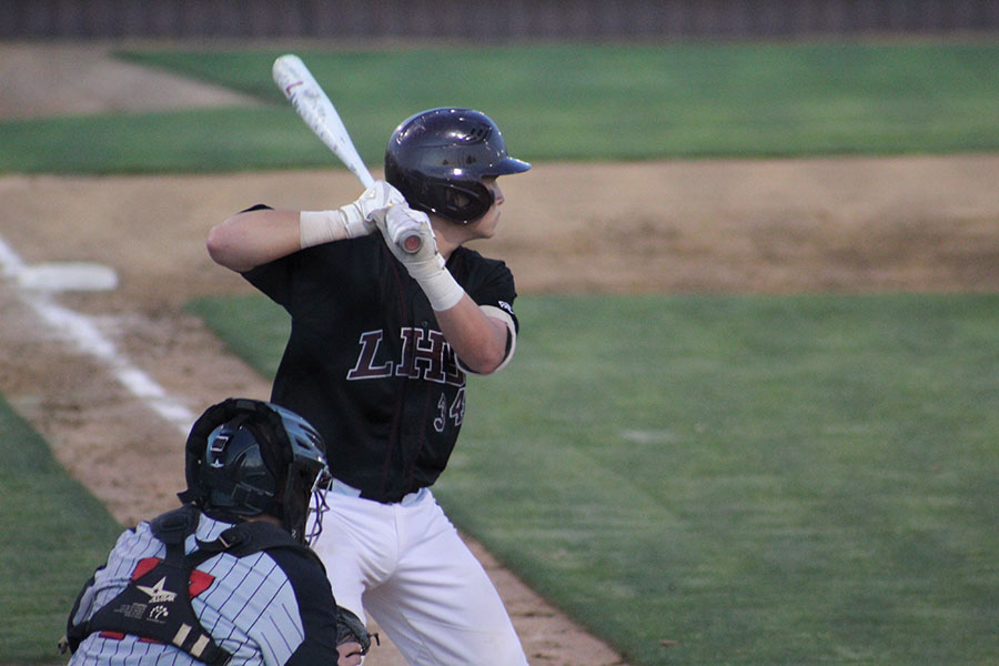 Senior+Dillon+Flores+prepares+to+hit+the+ball+during+a+game+against+Marcus+High+School+in+April+of+2019.+Courtesy+of+Hannah+Lancaster.