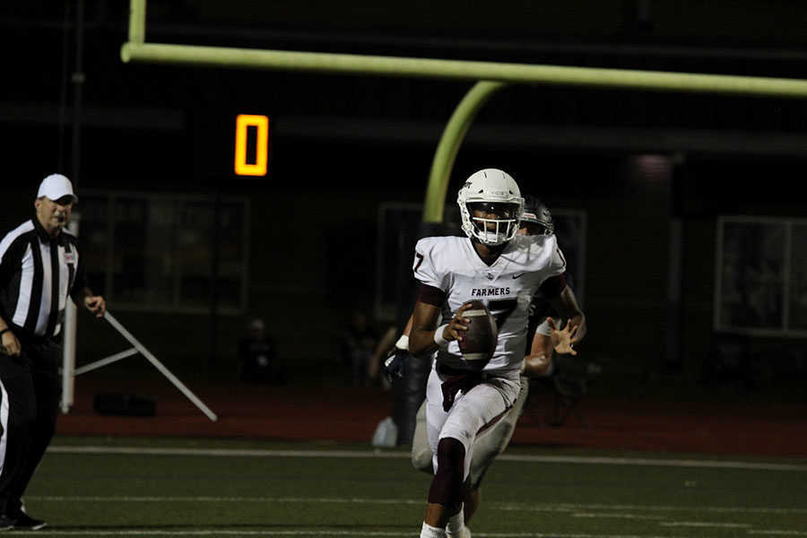 Junior+quarterback+Taylen+Green+%2817%29+runs+the+ball+down+the+field+at+the+home+game+against+Flower+Mound+on+Friday%2C+Sept.+27.