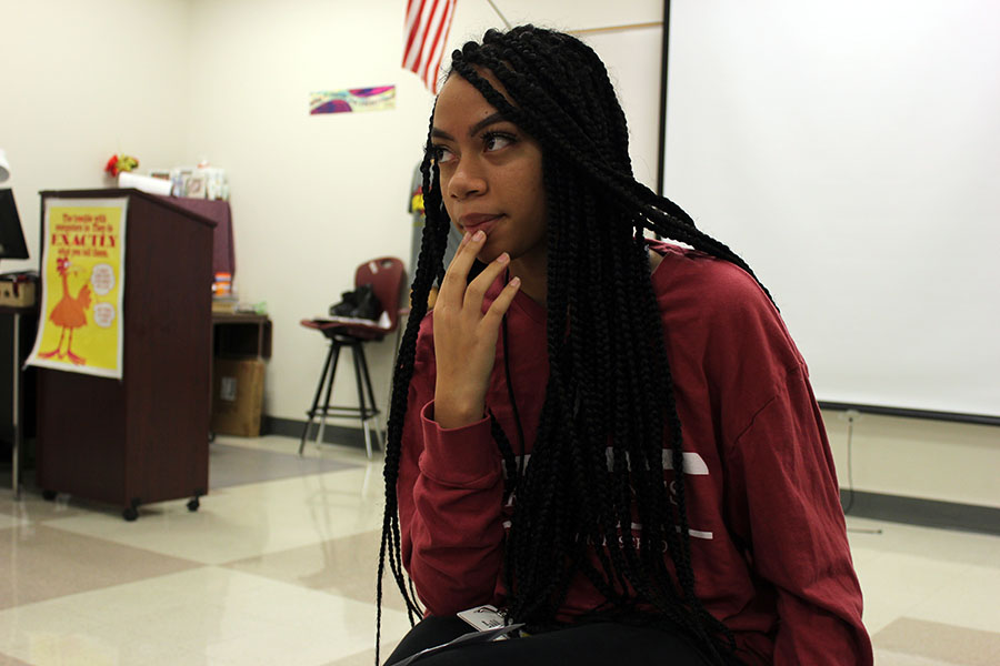 Senior+Brooke+Tillman+rehearses+a+scenario+for+DECA+in+E238+before+school+on+Monday%2C+Jan+12.
