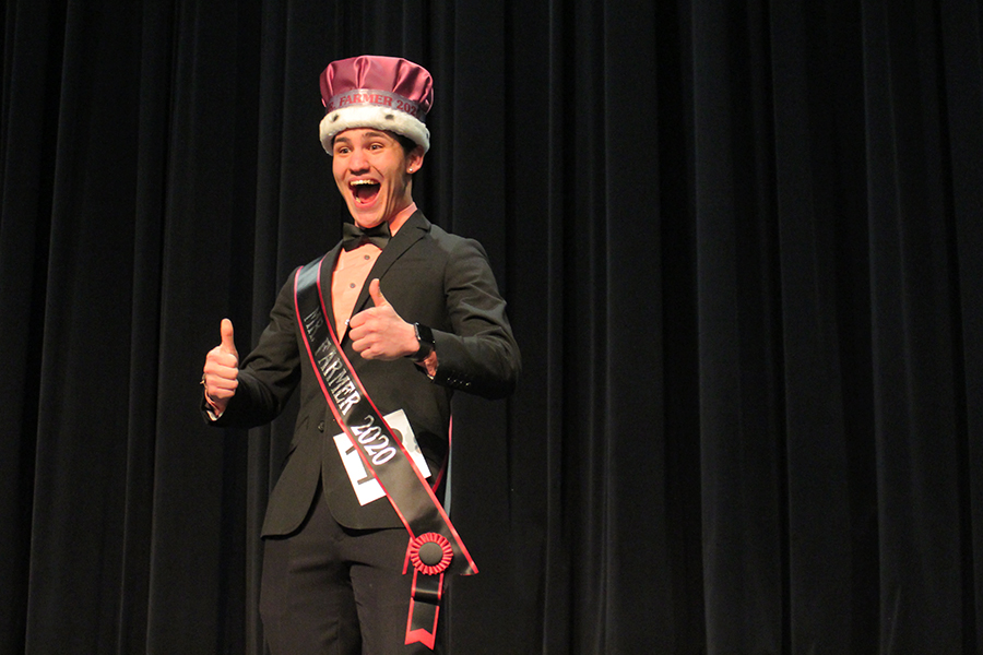 First place winner of Mr. Farmer senior Jimmy Piraino poses with a thumbs up after being crowned.